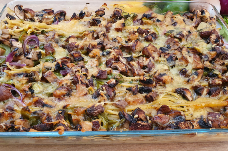 Vegan baked pasta with herbs de Provence white sauce and mushrooms